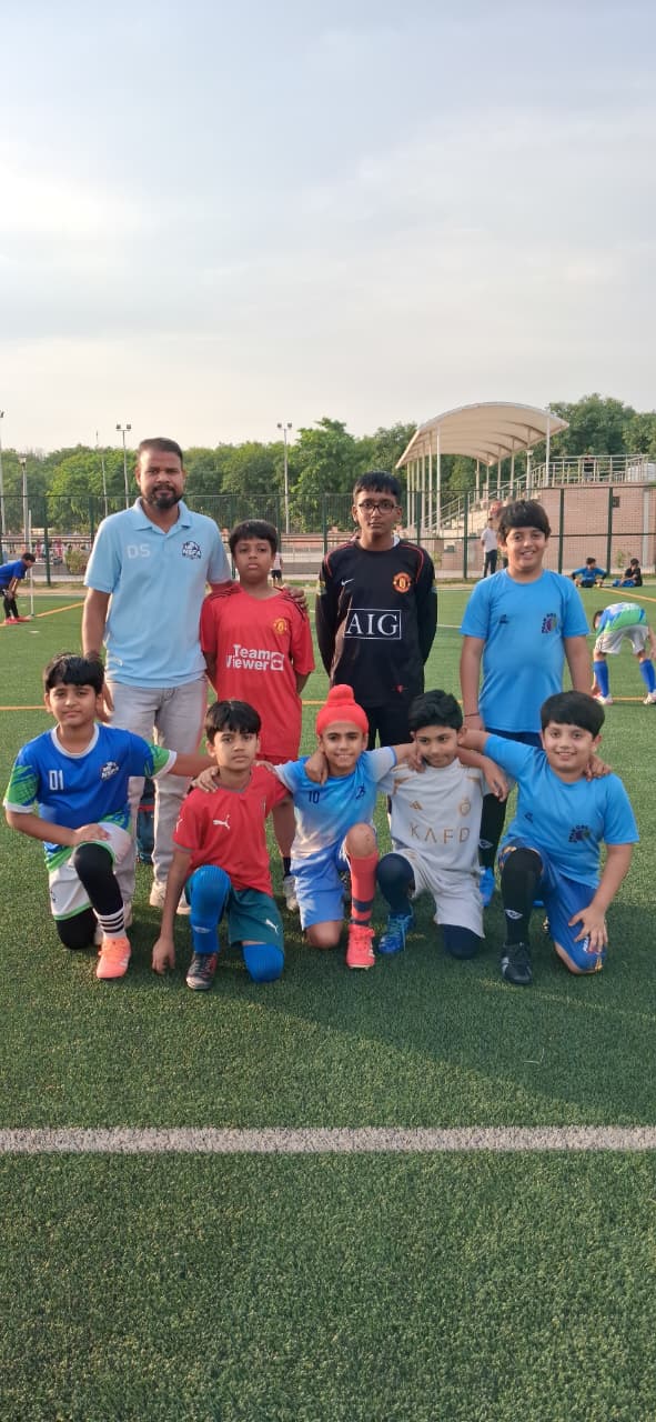 Junior squad with their coach before kick-off