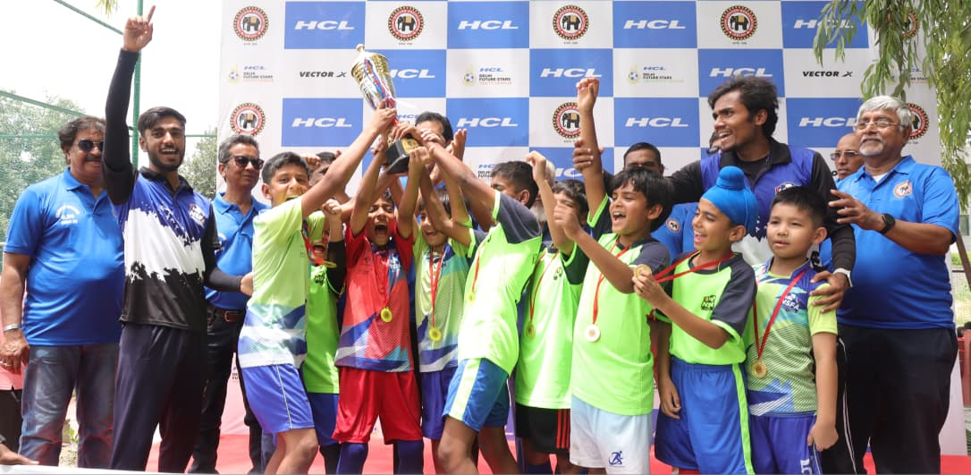 Championship victory celebration at the HCL Junior Football Tournament
